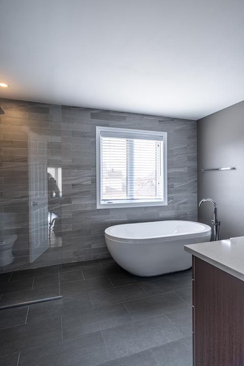 Tiles walls with free standing bath tub