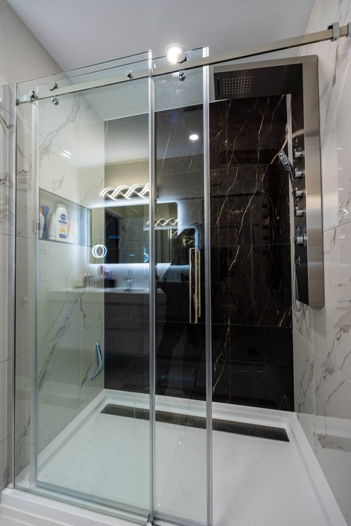 shower room renovation with large marble design tiles