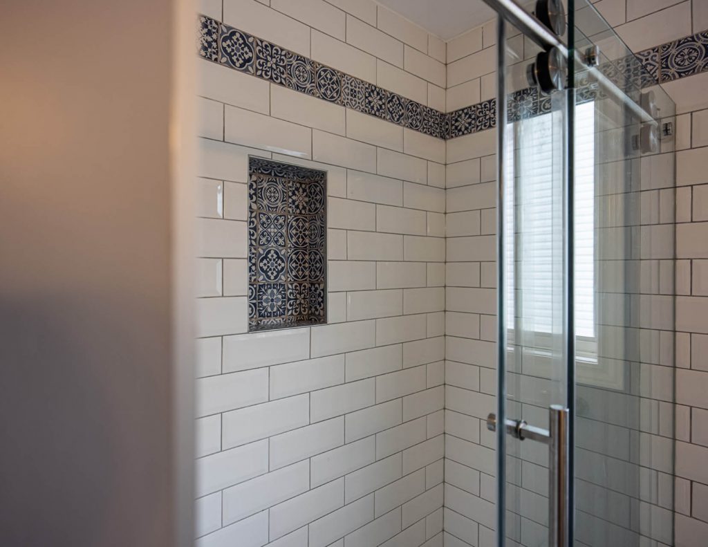 subway tiled wall with vintage border