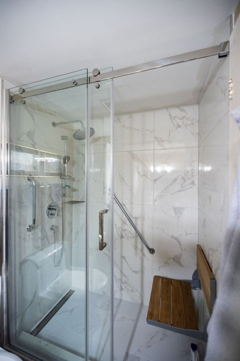 Elderly accessible tub to shower conversion