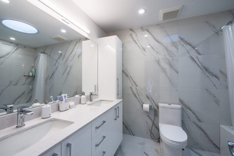 Renovated white stone bathroom